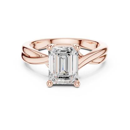 Lab-grown emerald cut solitaire ring in rose gold with twisted band design