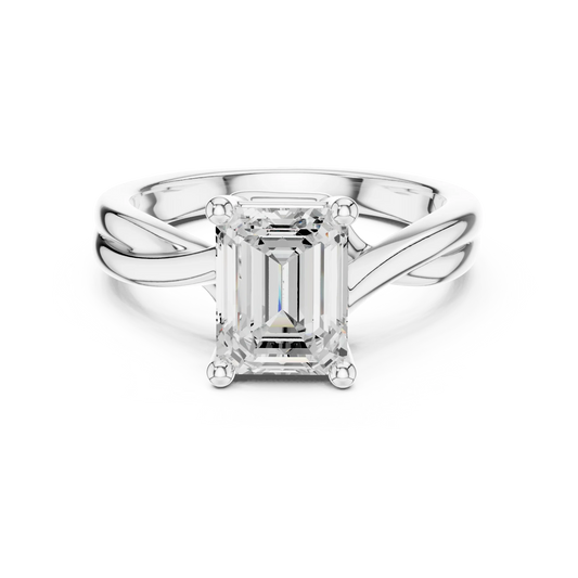 Lab-grown emerald cut solitaire ring in white gold with twisted band design