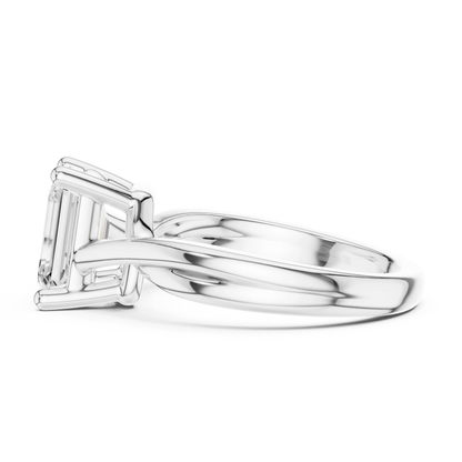 Side view of white gold emerald cut solitaire ring with twisted band and raised setting