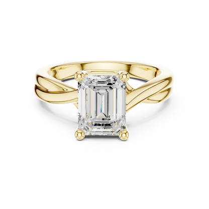 Lab-grown emerald cut solitaire ring in yellow gold with twisted band design