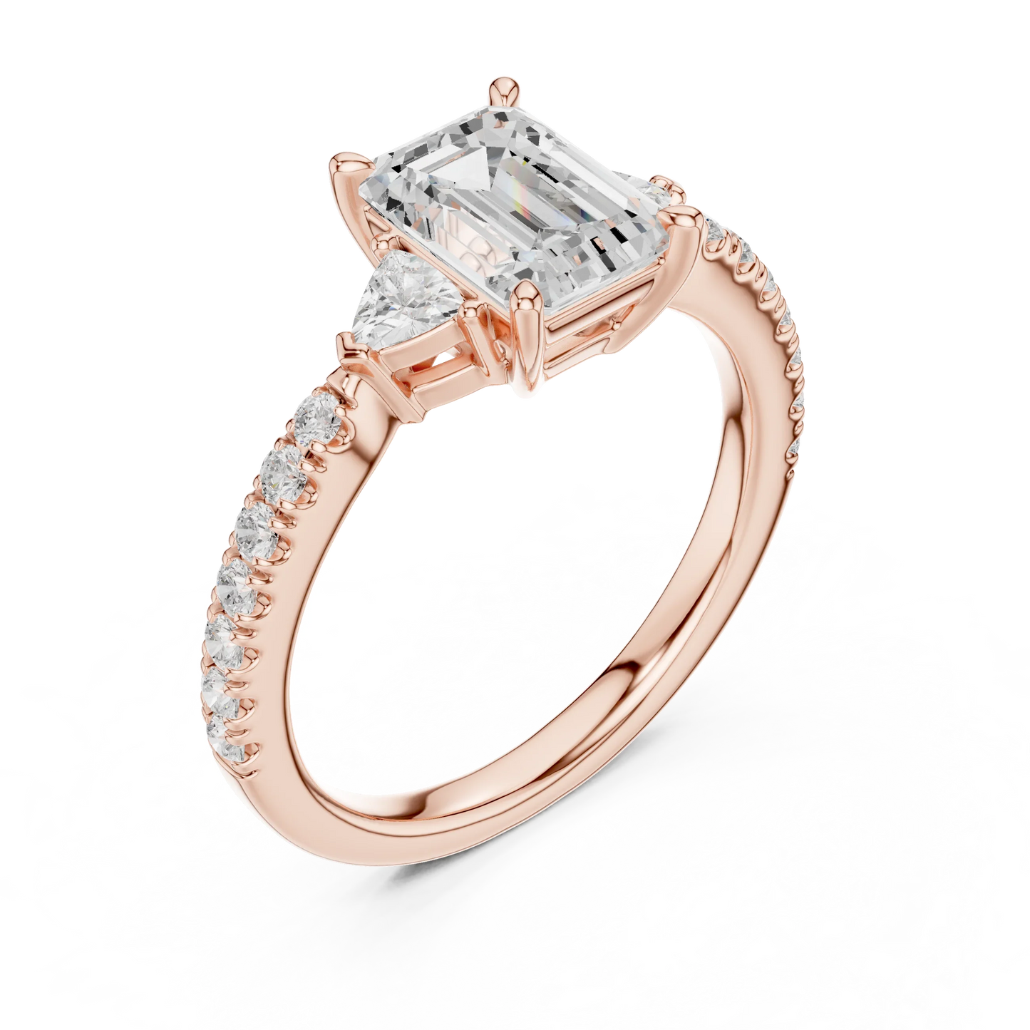 Front view of rose gold emerald three stone diamond pave ring, showcasing gemstone brilliance.