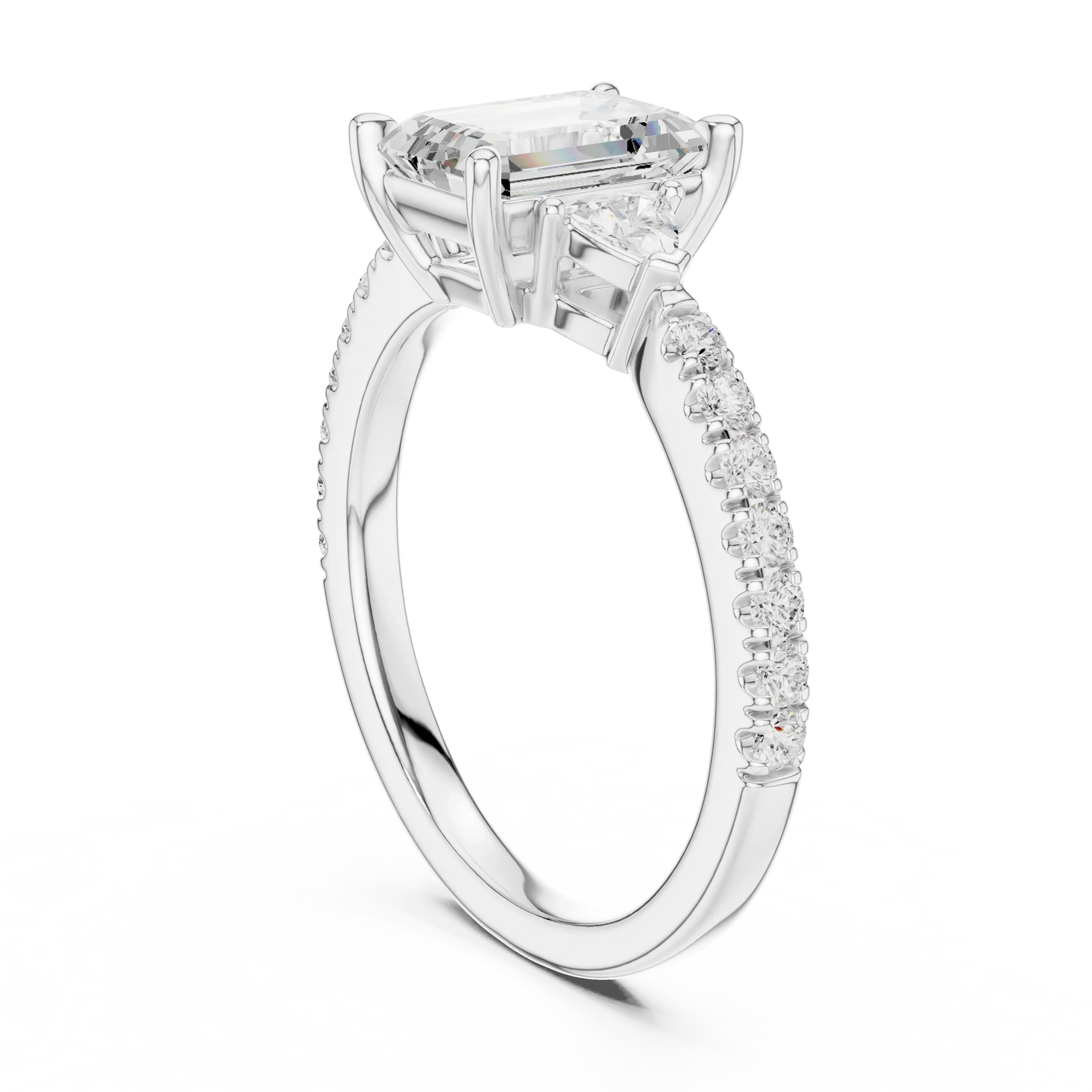Back side view of white gold emerald three stone diamond pave ring, showing band and setting.