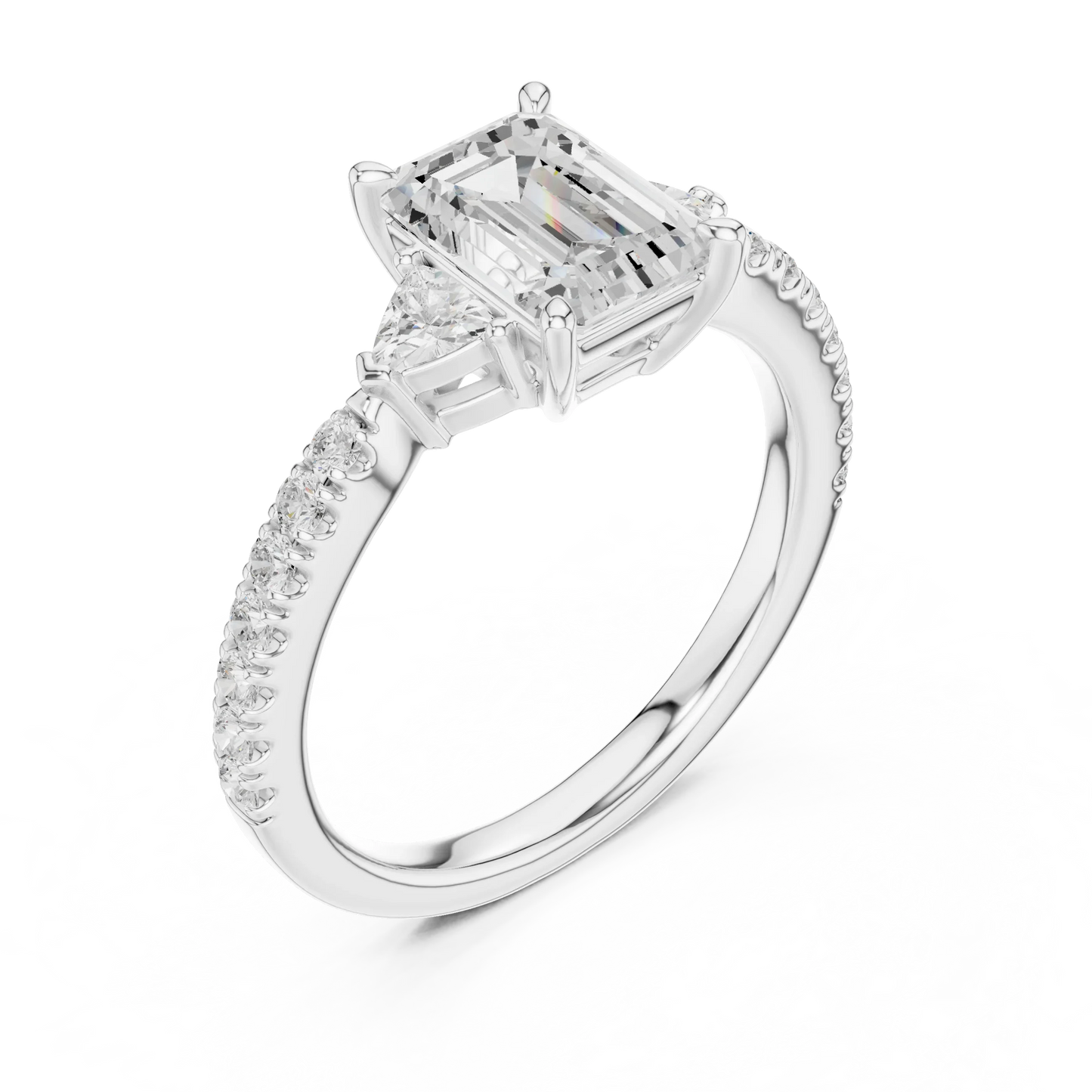 Front view of white gold emerald cut three stone diamond pave ring, showcasing center and side stones.
