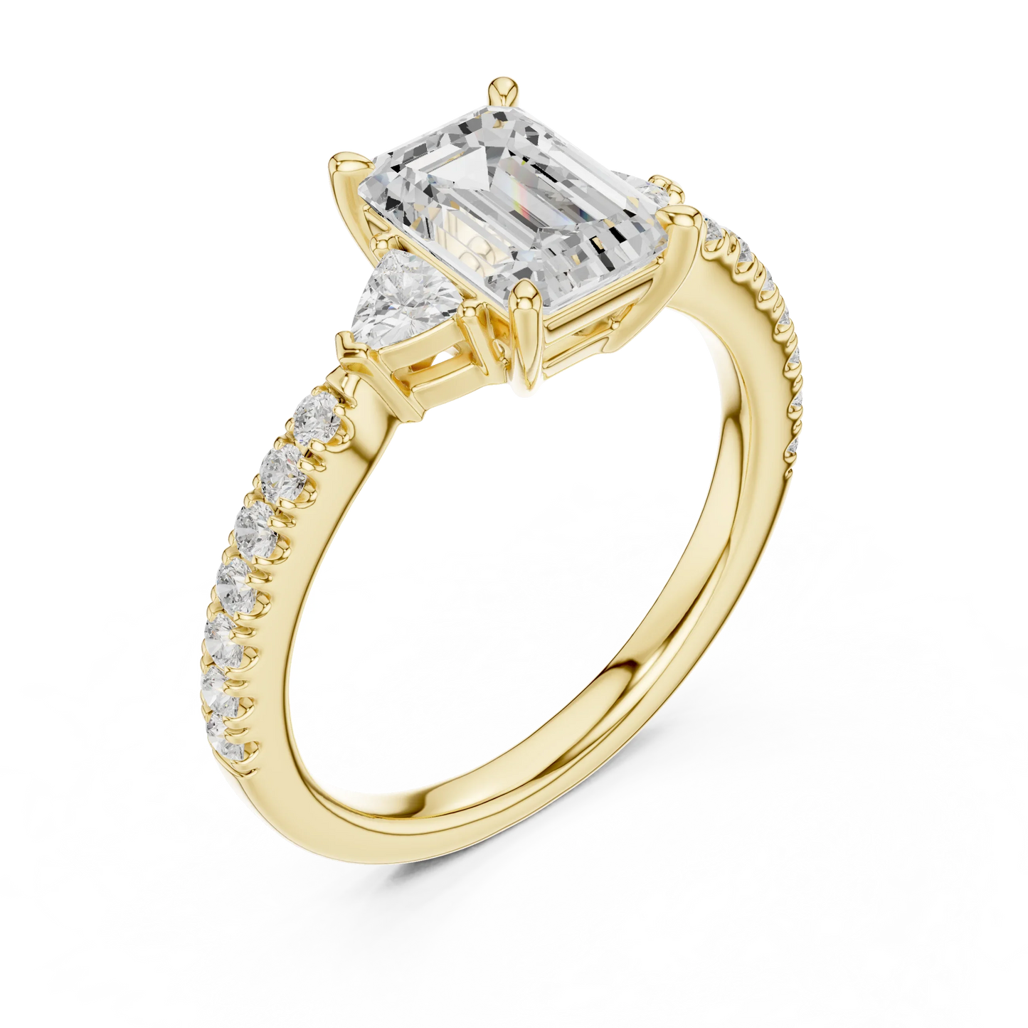 Front view of yellow gold emerald three stone diamond pave ring, emphasizing brilliance.