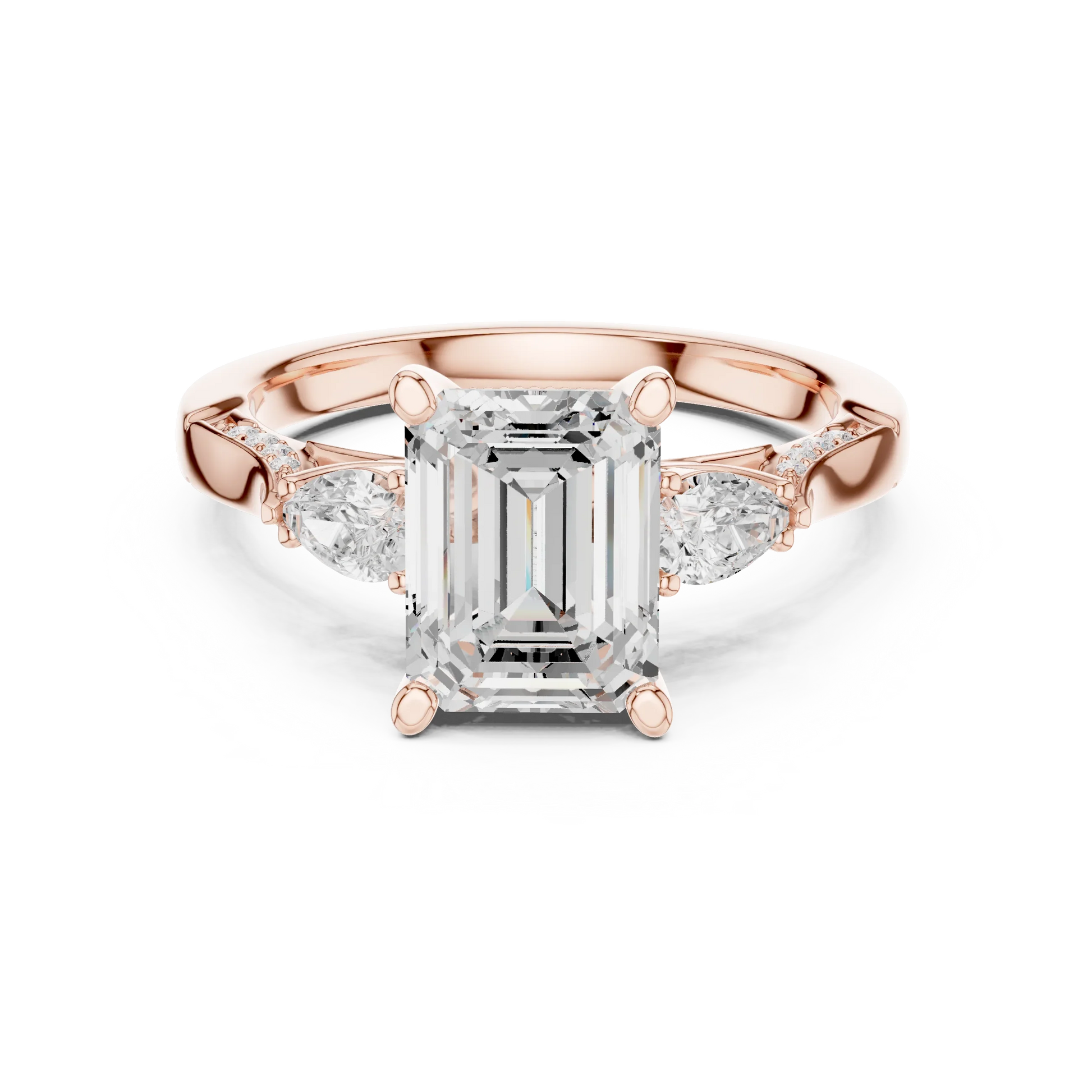 Emerald three stone ring in rose gold with pear side stones, accent band and lab-grown diamonds 鈥?Australia