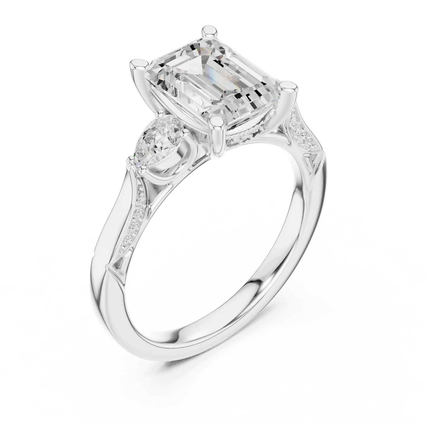 Front view of white gold emerald three stone ring with pear side stones, accent band and lab-grown diamonds 鈥?Australia
