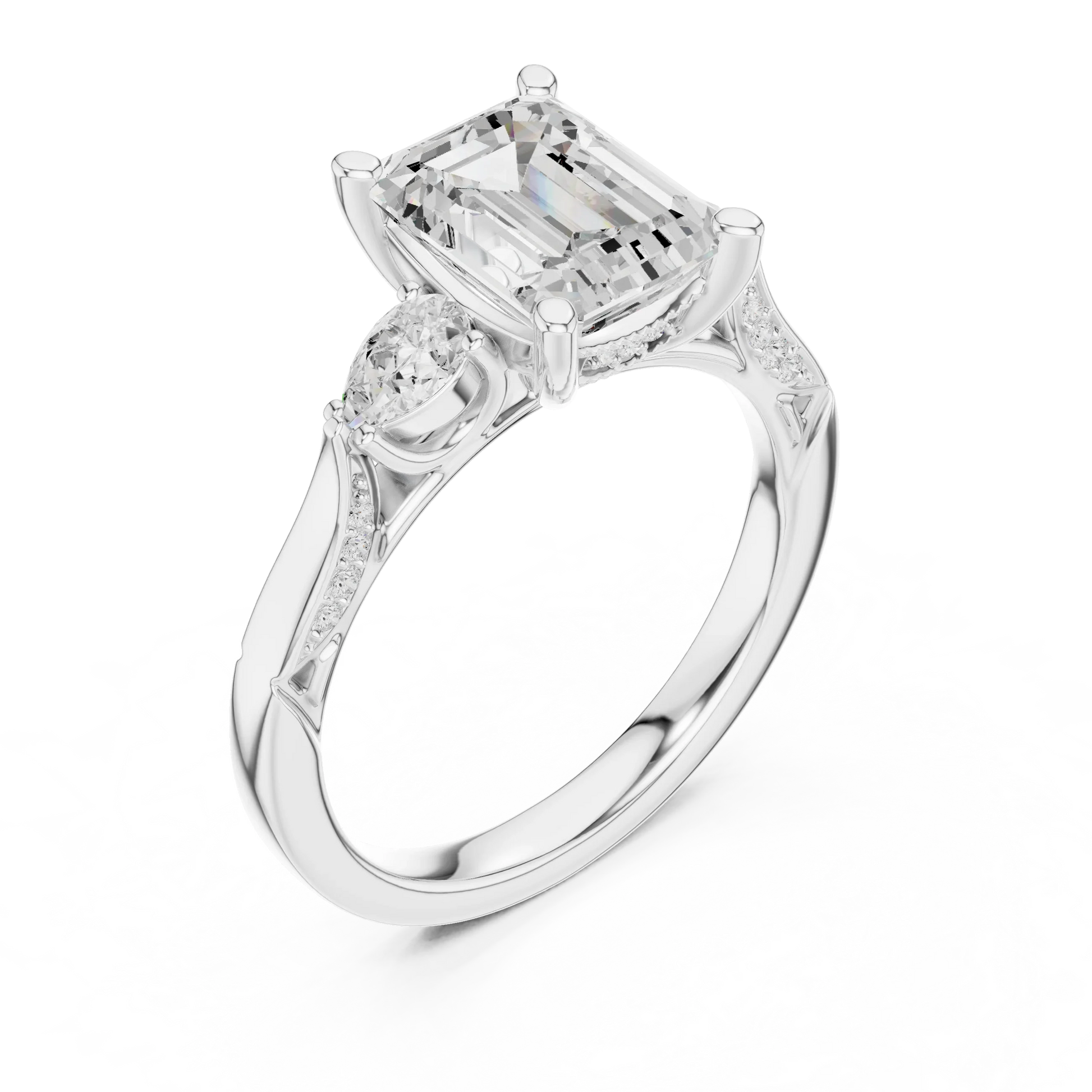Front view of white gold emerald three stone ring with pear side stones, accent band and lab-grown diamonds 鈥?Australia