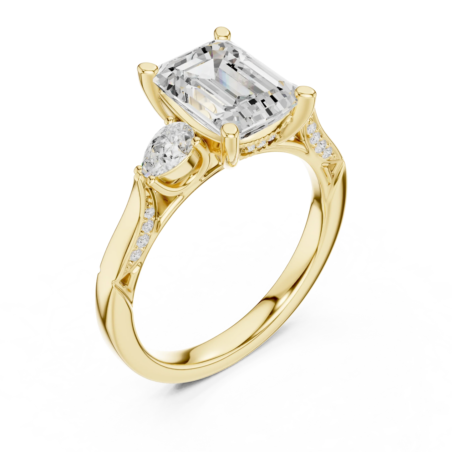 Front view of yellow gold emerald three stone ring with pear side stones, accent band and lab-grown diamonds 鈥?Australia