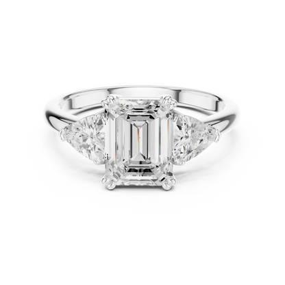 Emerald three-stone ring in white gold with trillion cut side stones and lab-grown diamond 鈥?Australia