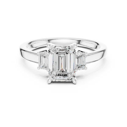 Lab-grown emerald cut three stone diamond ring in white gold, elegant top view