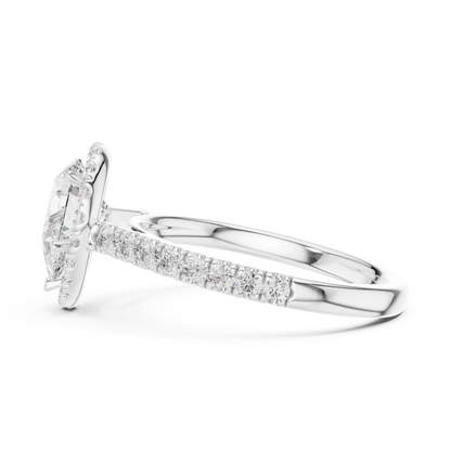 Side view of white gold pear cut diamond ring with eternal halo setting showing elevated center stone and refined band profile