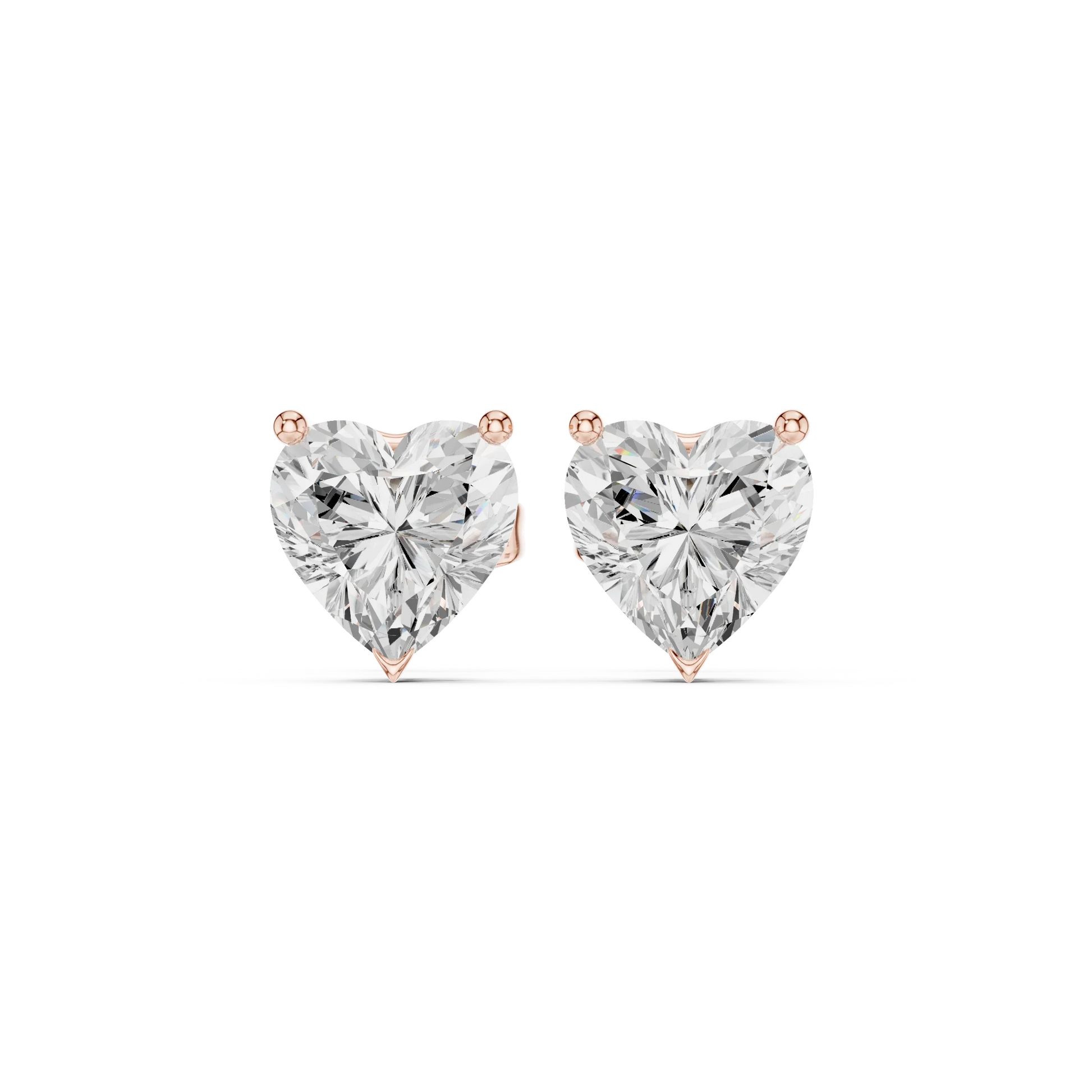 Rose gold Heart-shaped diamond earrings on a white background