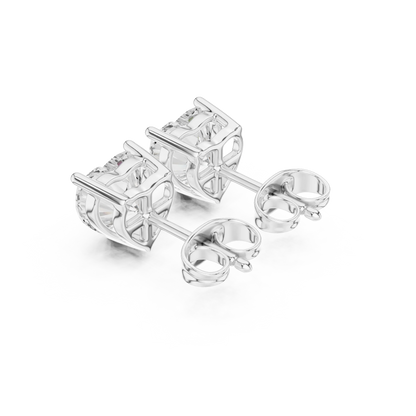 Pair of silver stud earrings on a white background with back side view