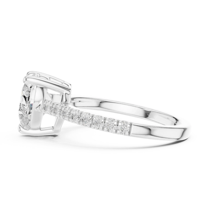 Side view of white gold heart-shaped diamond pavé band ring with detailed band setting