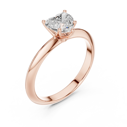 Front view of rose gold heart diamond solitaire ring, showcasing gemstone brilliance