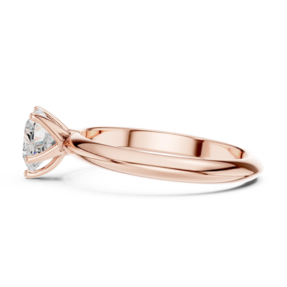 Side view of rose gold heart shape diamond solitaire ring, highlighting design profile
