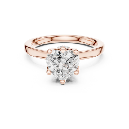 Rose gold heart cut solitaire ring with hidden halo and domed band featuring lab-grown diamond, modern romantic design