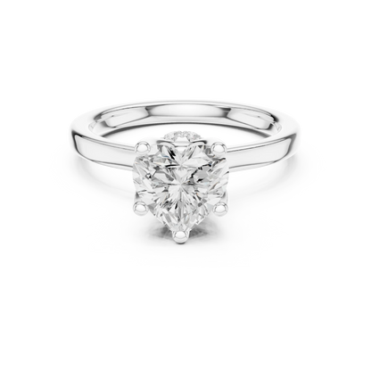 White gold heart cut solitaire ring with hidden halo and domed band featuring lab-grown diamond, elegant romantic design