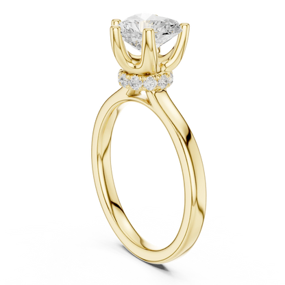 Back view of yellow gold heart cut solitaire ring showing hidden halo and domed band details