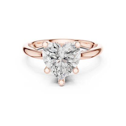 Rose gold heart cut solitaire ring with hidden halo and domed band featuring lab-grown diamond, modern romantic design