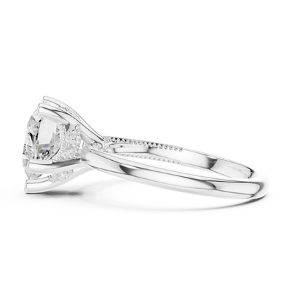 Side view of white gold heart cut solitaire ring highlighting hidden halo and domed band design