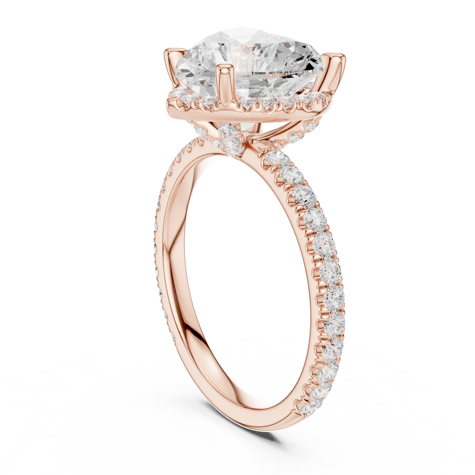 Back side view of rose gold heart cut solitaire ring showing hidden halo and thin pav茅 band structure