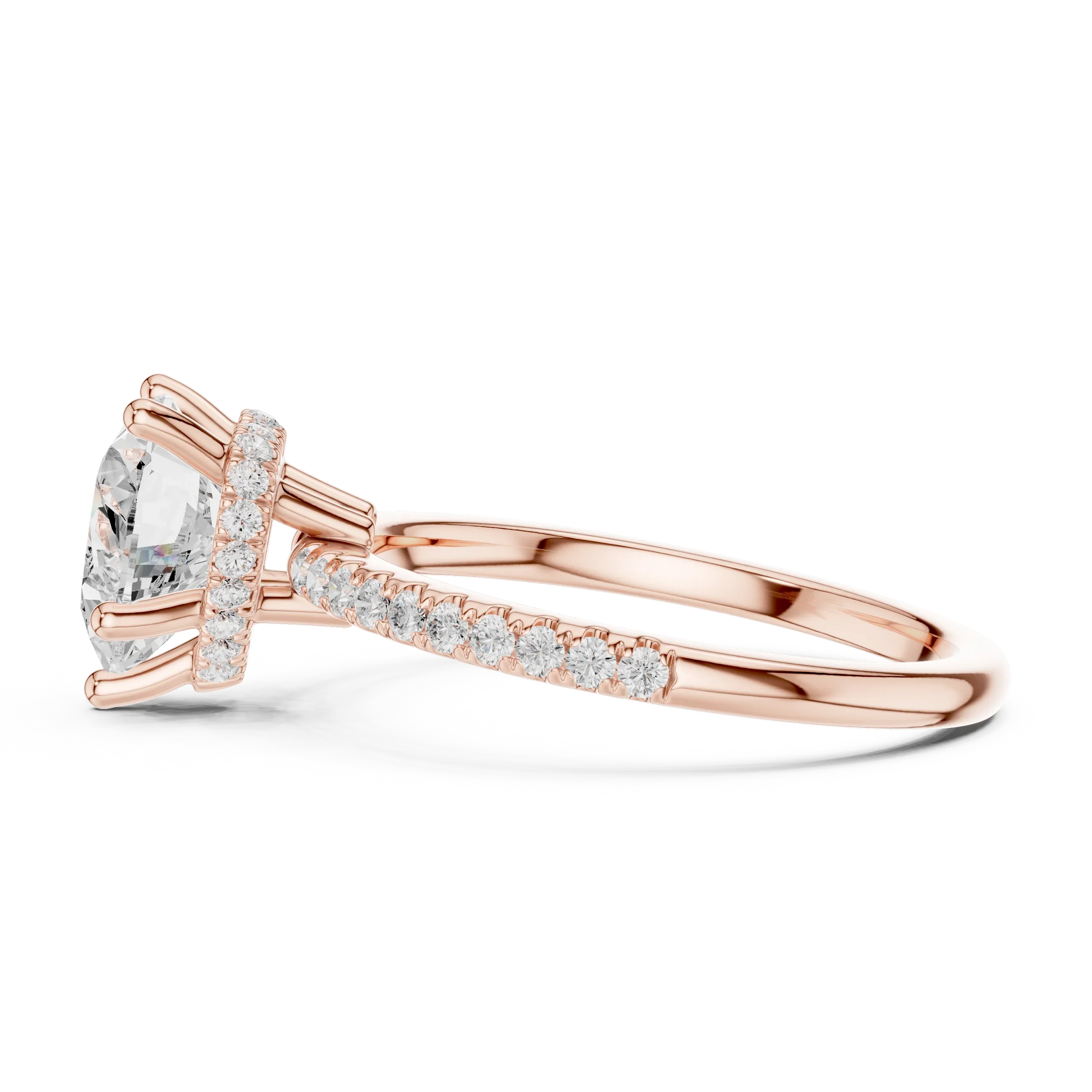 Side view of rose gold heart cut solitaire ring highlighting thin pave band and prong setting