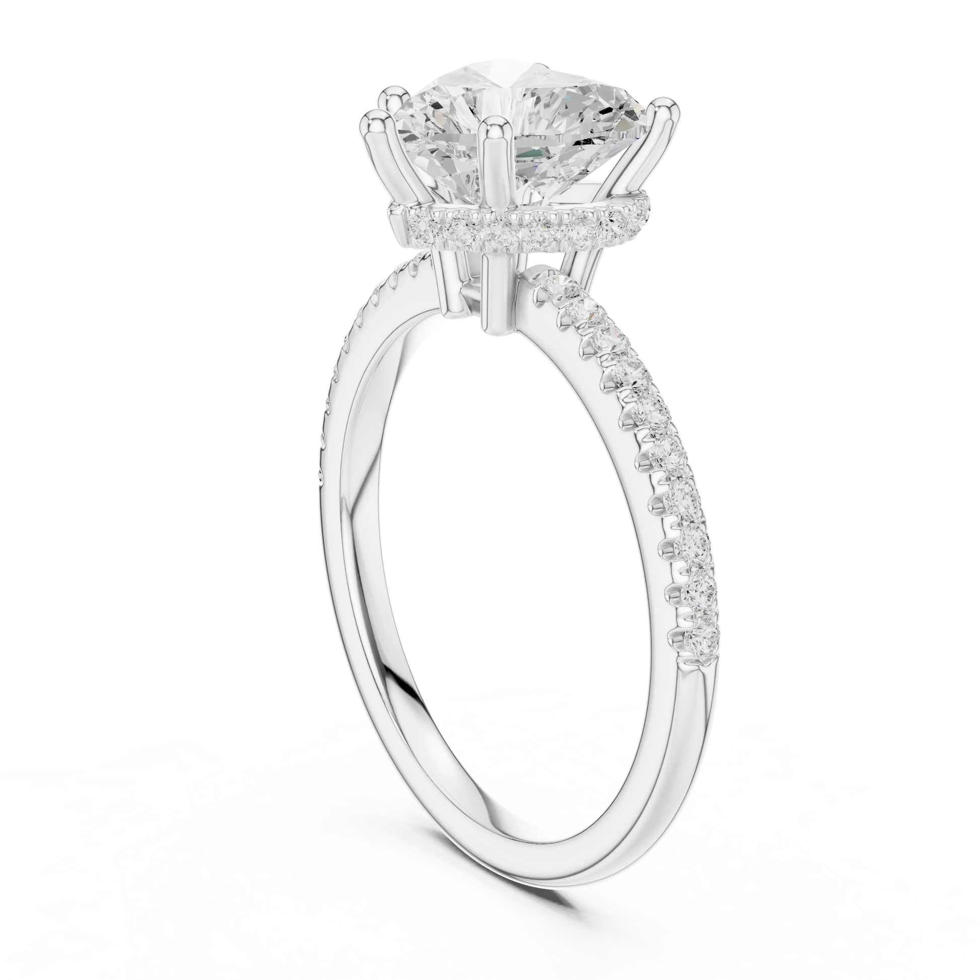 Back side view of white gold heart cut solitaire ring showing thin pave band and setting details
