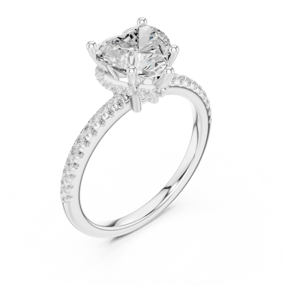 Front view of white gold heart cut solitaire ring with thin pave band and lab-created diamond