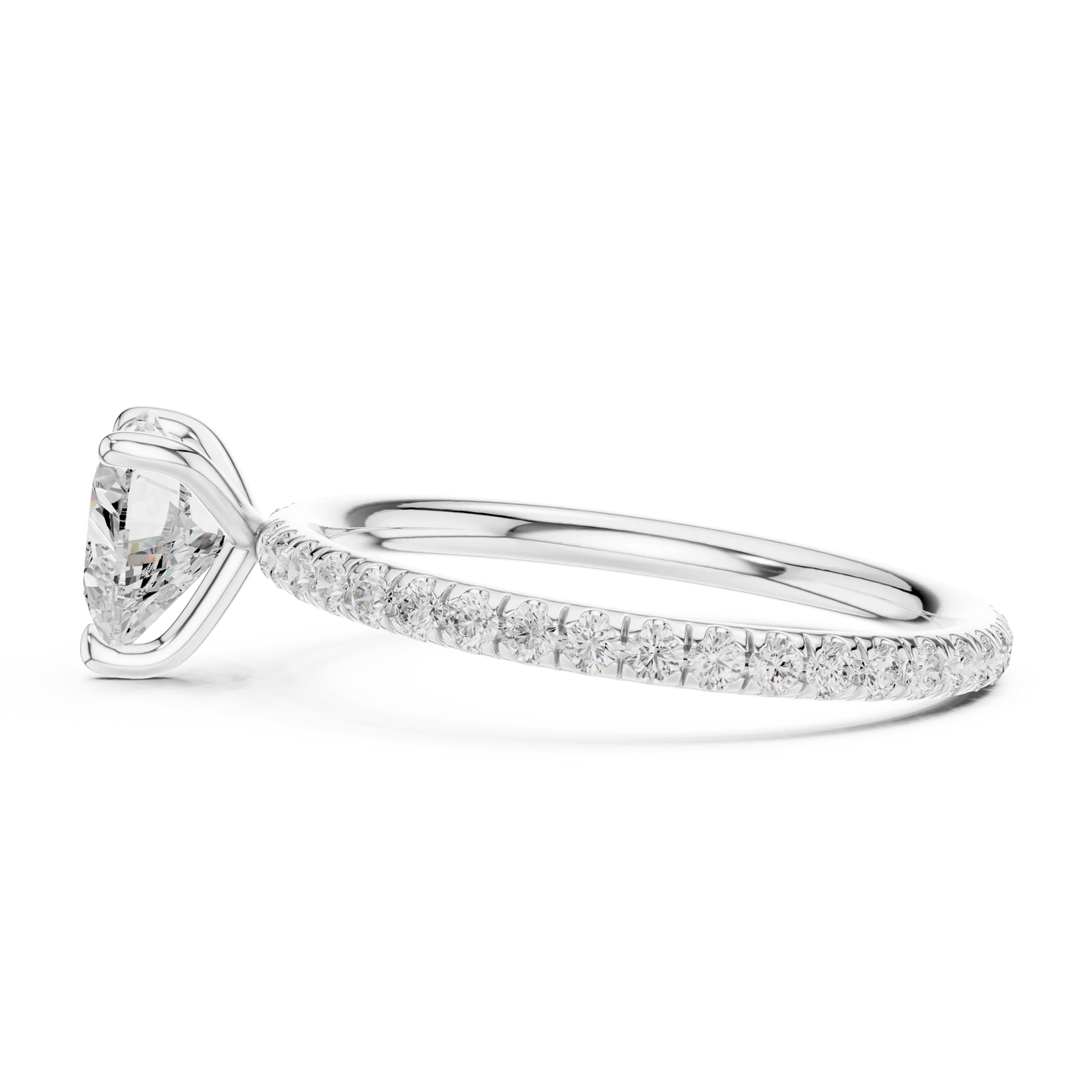 Side view of white gold heart shape solitaire ring with thin pavé diamond band and raised setting