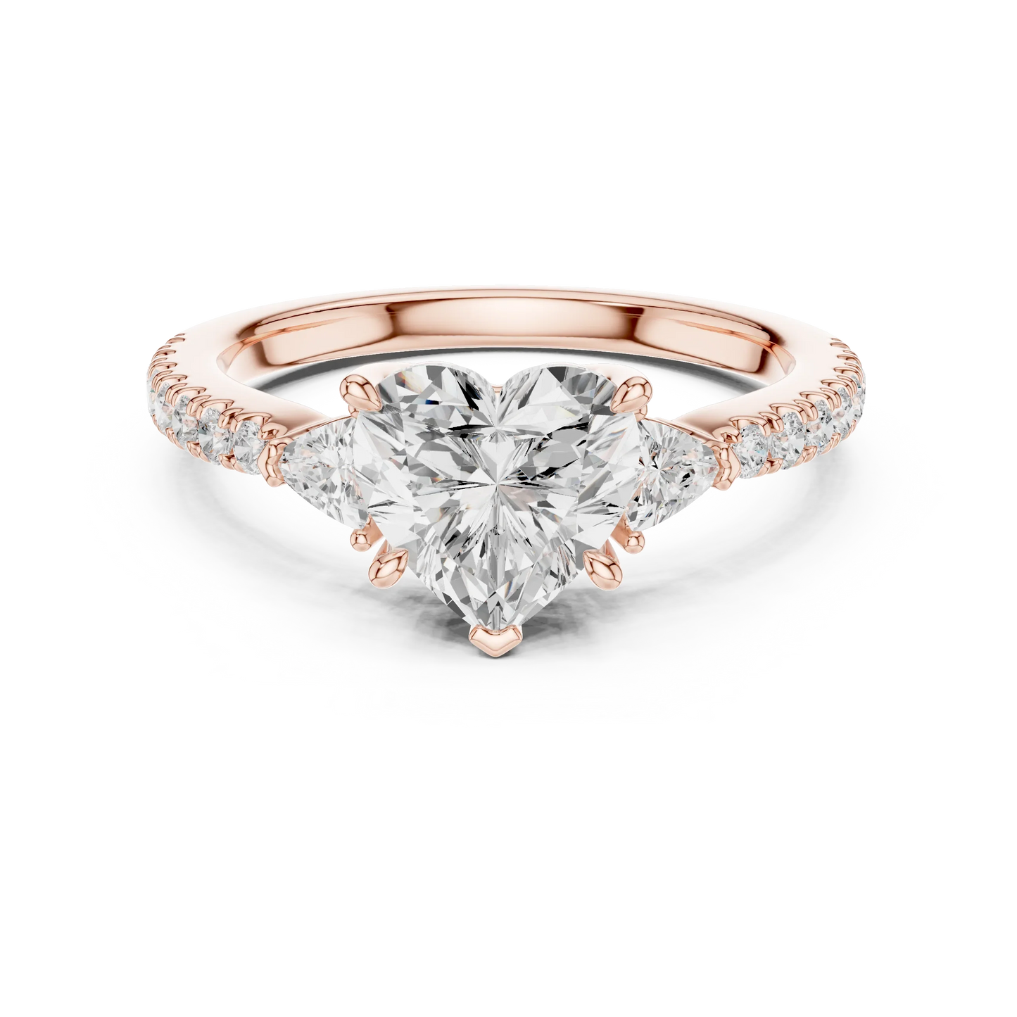 Lab-grown heart shape three stone diamond ring with half moon side stones and pave band in rose gold, top view.