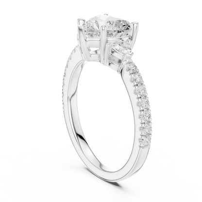 Back side view of white gold heart shape three stone diamond pave ring, showing band and setting.