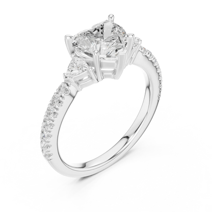 Front view of white gold heart shape three stone diamond pave ring, showcasing center and side stones.