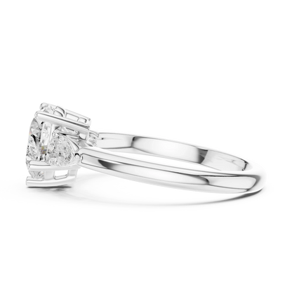 Side view of white gold heart three-stone ring with pear side stones and lab-grown diamond 鈥?Australia
