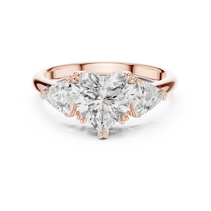 Heart three-stone ring in rose gold with trillion cut side stones and lab-grown diamond 鈥?Australia