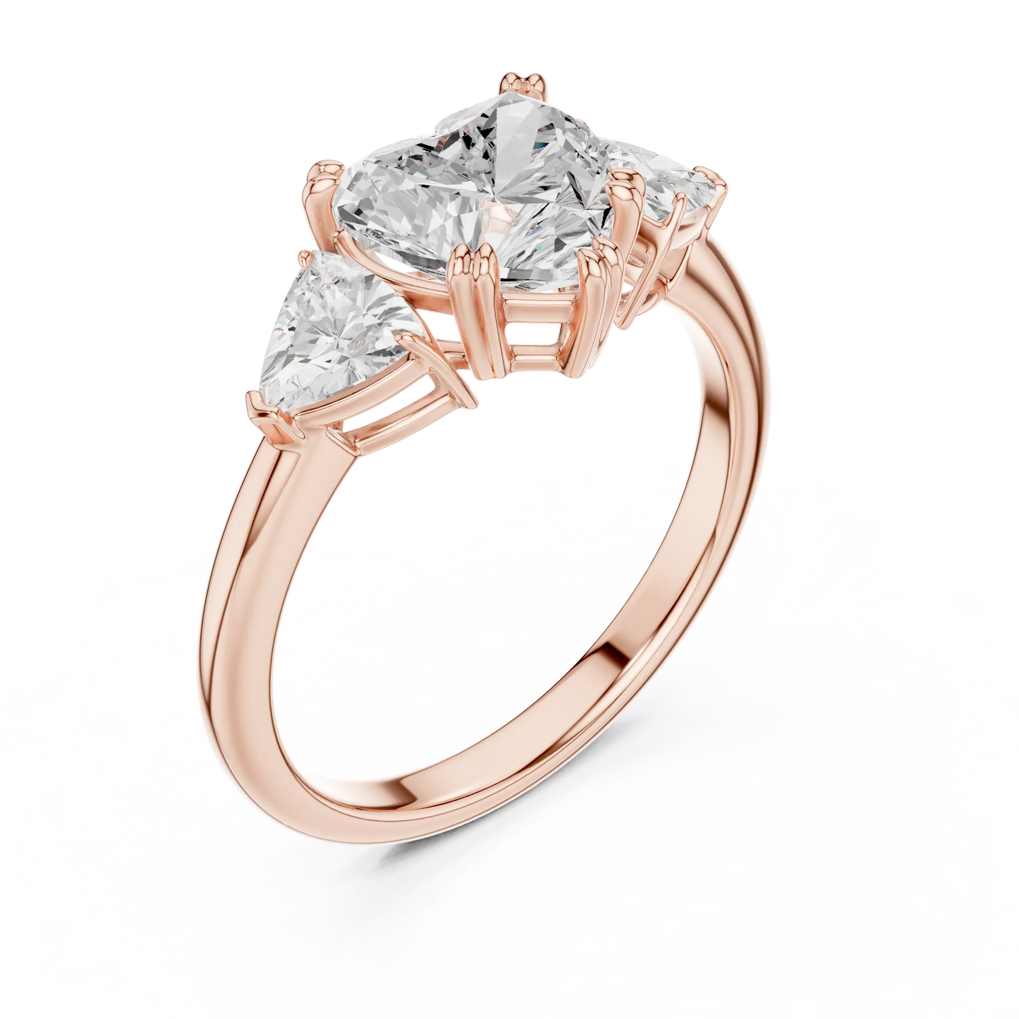 Front view of rose gold heart three-stone ring with trillion cut side stones and lab-grown diamond 鈥?Australia