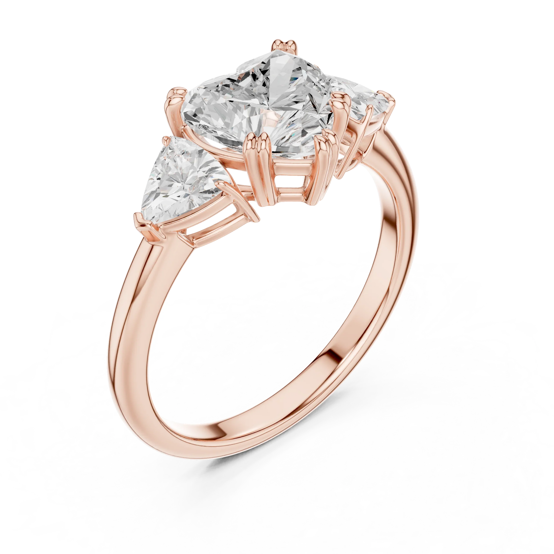 Front view of rose gold heart three-stone ring with trillion cut side stones and lab-grown diamond 鈥?Australia