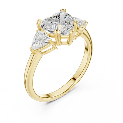 Front view of yellow gold heart three-stone ring with trillion cut side stones and lab-grown diamond 鈥?Australia