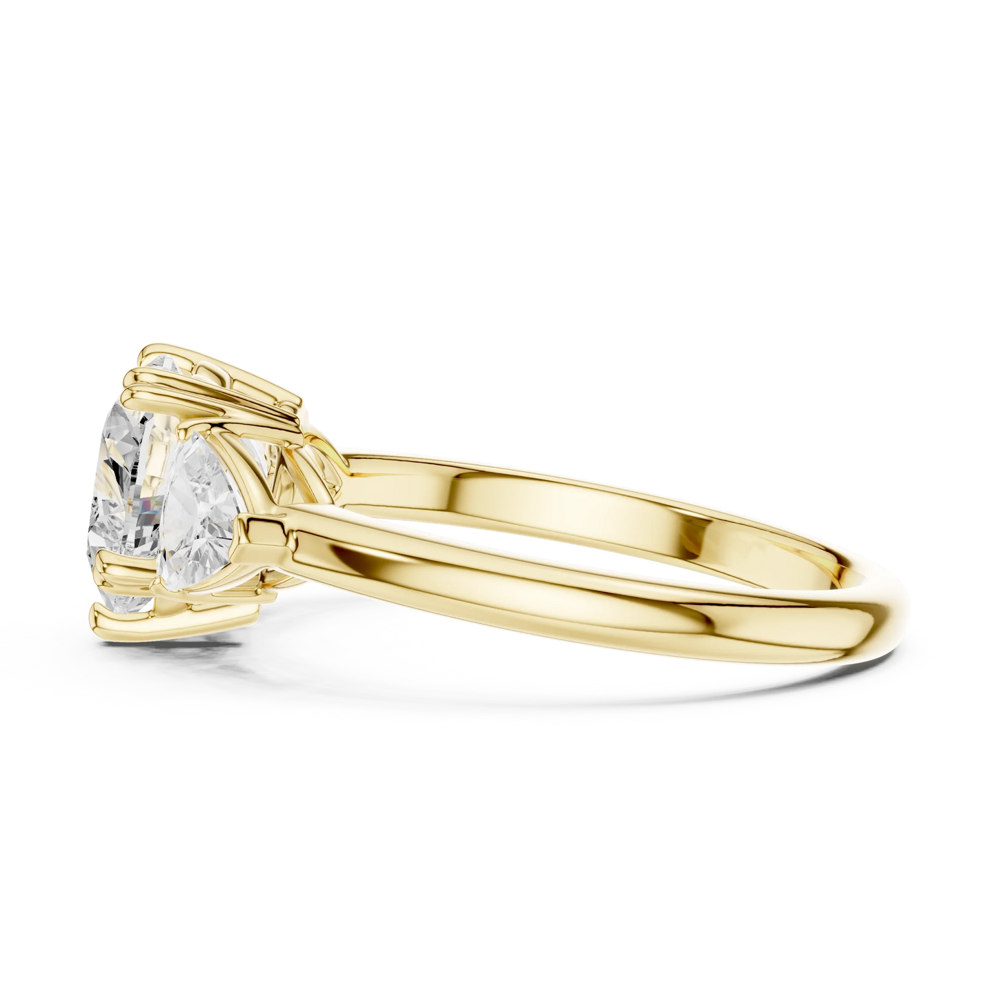 Side view of yellow gold heart three-stone ring with trillion cut side stones and lab-grown diamond 鈥?Australia