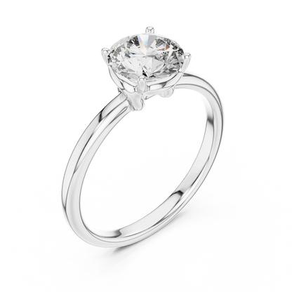 Top view of round cut diamond ring in white gold with round gemstone