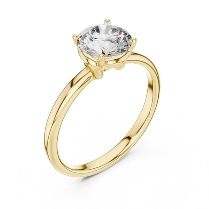 Top view of round cut diamond ring in yellow gold with round gemstone