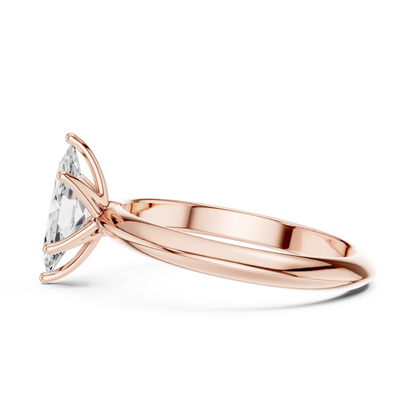 Side view of rose gold marquise cut diamond solitaire ring, highlighting design profile.