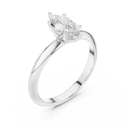 Front view of white gold marquise cut diamond solitaire ring, showcasing center stone.