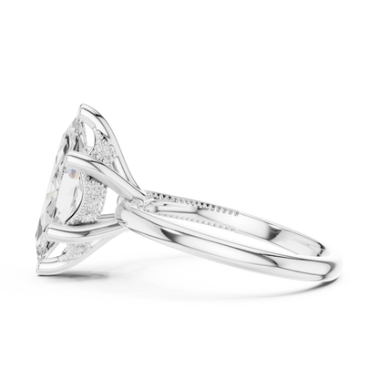 Side view of white gold marquise cut solitaire ring highlighting hidden halo and domed band design