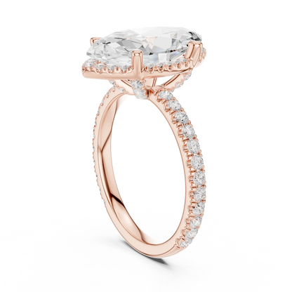 Back side view of rose gold marquise cut solitaire ring showing hidden halo and thin pav茅 band structure
