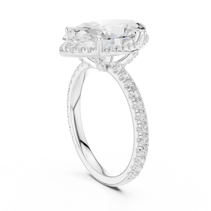 Back side view of white gold marquise cut solitaire ring showing hidden halo and thin pav茅 band details