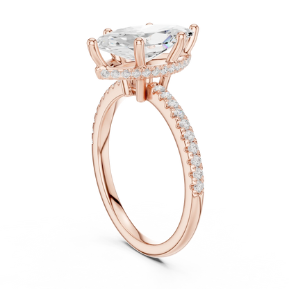 Back side view of rose gold marquise cut solitaire ring showing thin pave band and setting structure