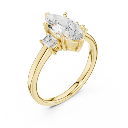 Front view of yellow gold marquise three stone diamond ring, emphasizing brilliance.