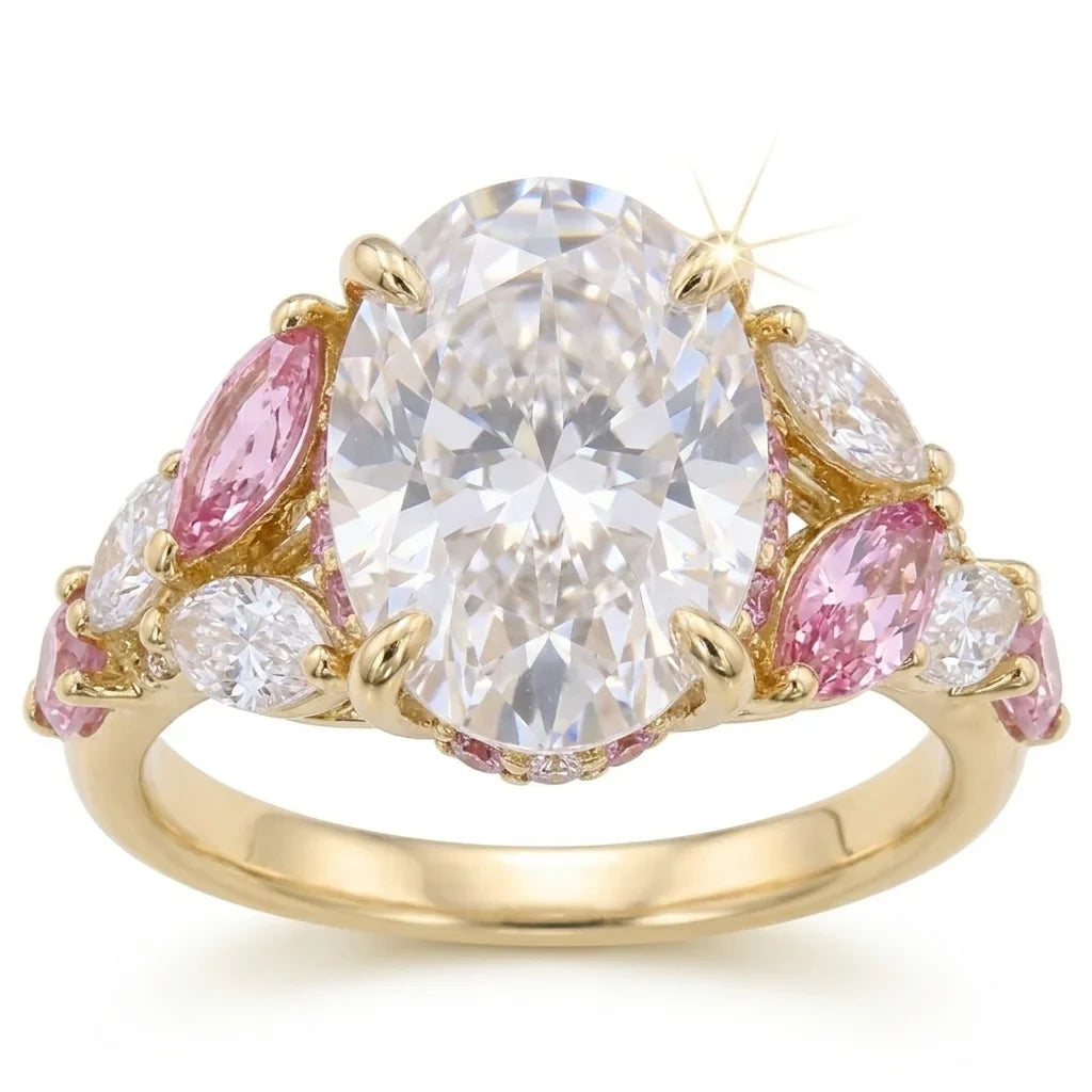 Front view of yellow gold oval center stone ring with pink marquise and white pear side cluster accents with lab-grown diamonds – Australia