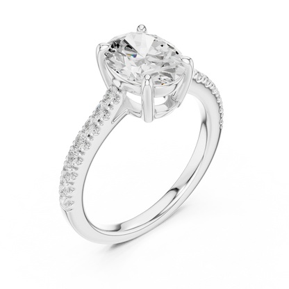 Front view of white gold oval diamond pavé band ring